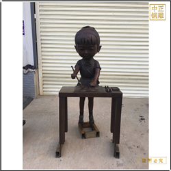 小女孩寫(xiě)毛筆字銅雕塑